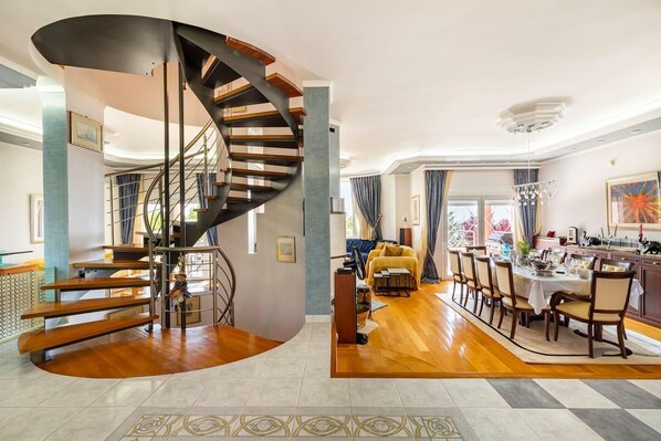Bright dining room with plenty of seats, your first sight after entering the villa.