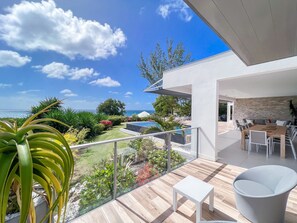 View from Shaded Terrace of Pool and Ocean