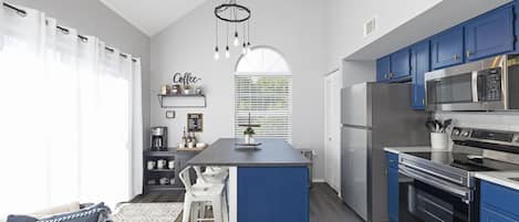 Wide open Kitchen with great lighting!