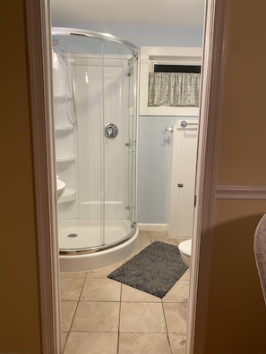 Shower stall in bathroom