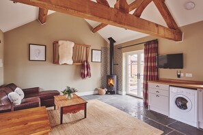 The living room and kitchen at Stable Cottage, Worcestershire