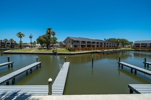 Boat Slip - Pull up your boat at the deck! Cruise along the calming waters and return back home for a nice al fresco meal on the patio!