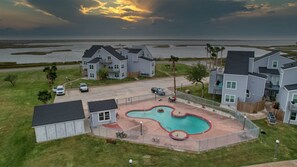 A Pool Makes All The Difference - After a long day of building sandcastles and beachcombing, cool off in the refreshing waters of the The Villas pool.