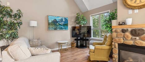 Main floor living room with gas fireplace