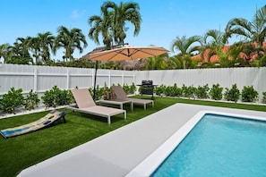 Work on your vacation tan by the pool.