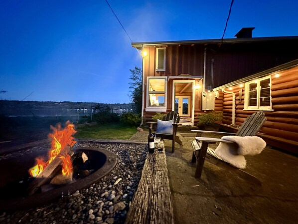 The fire pit begs for s'mores and nights under the stars