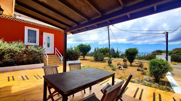 Your shaded front porch with a great ocean view.