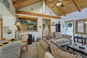 Relax on comfy couches, watching TV.