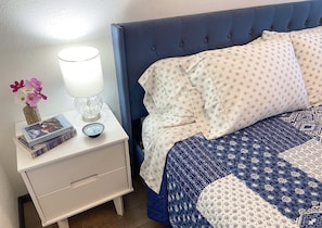 King size bed with 100% cotton bedding