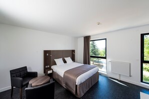 Relax on the comfy bed after a day outside.