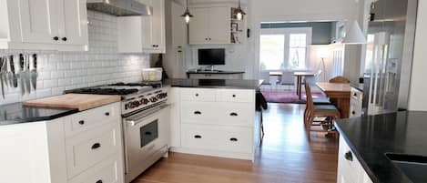 Kitchen/dining area with a designer appliances