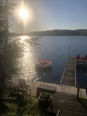 view of dock area with beautiful sunset