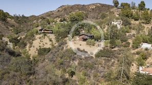 Nestled in the beautiful Santa Monica Mountains on one acre of private land