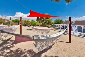 Wrap yourself up in a hammock for a nice afternoon nap or star gaze at night.