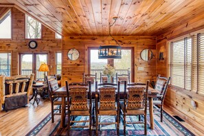 Spacious dining adjacent the living and kitchen