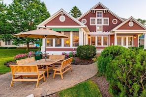 Outdoor dining area in the rear of the house on the lake.