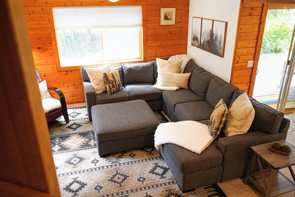 Large sofa for cozying up to movie nights or playing board games.