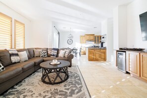 Living Room with TV, Dry Bar, and Drink Refrigerator 