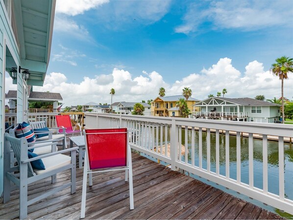 Relax. Unwind. Reset. - The balcony of Sandy Oasis makes the perfect place to relax after a day on the beach.