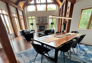 Open concept cottage with natural light cascading through the soaring windows.