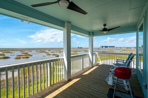 Picture Perfect - The view from the balcony of Birds on the Bay could befit any postcard! Come see it for yourself.