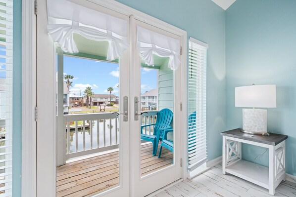 Windows Galore - The large, elegant windows allow the living room to be filled with lots of natural lighting.