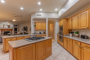 Preparing home cooked meals is easy in our spacious and fully stocked kitchen.