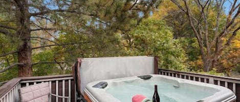 Hot tub on private, secluded deck off living room area 