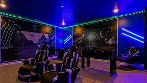 The game room is stylishly furnished with Star Wars theme with cool lights.