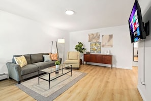 Beautifully Decorated Living Room with 55" Smart TV with Your Favorite Apps