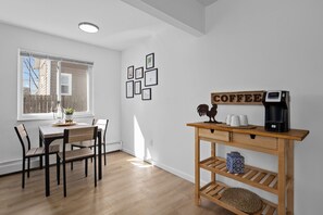 Start your morning right with the coffee bar! – complete with a coffee maker and coffee pods.