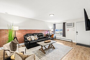 This Airbnb is perfect for anyone looking for a comfortable and relaxing place to stay. The living room is spacious and has plenty of seating, making it perfect for a group of friends or family.