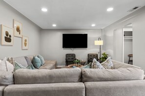 Comfortable living room with a smart tv.