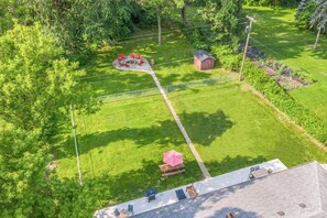 The fenced in backyard area is perfect for kids & pets to roam without worry