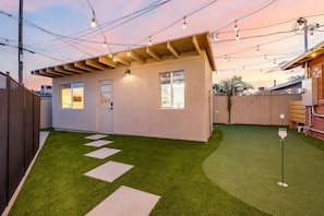 Putting green and entry into the guest house