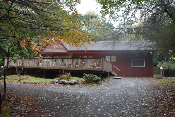 House front with deck and 12 car parking