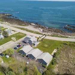 aerial view of "Snug Harbor", across the street from the ocean, large lawn area to relax, sunbath, and walking distance to Wallis Sands