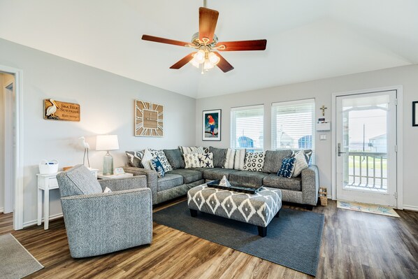 Bright and airy living area with wall of windows