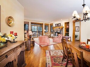 Warm up by the fireplace or entertain at the dining table.