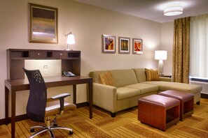 Sit back on the sofas or make use of the desk!