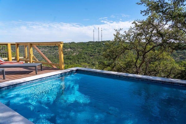 heatable plunge pool overlooking nature trail