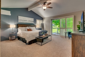 Spacious upstairs master suite with private balcony and new luxury tile shower