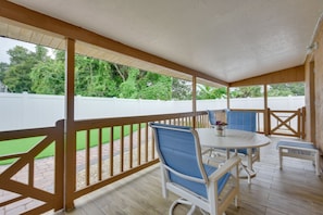 Covered Patio | Outdoor Dining Area | Shared Fenced Yard