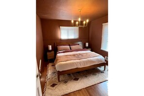 The Terracotta Room: New King Nectar mattress. Romantic amber lighting. 