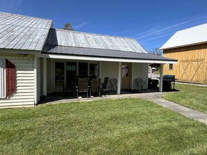 1825 Barn Covered patio w/ outdoor dining.