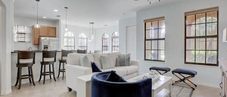 The Family Room Is Quite Cozy and has 2 Windows Looking Towards the Lanai