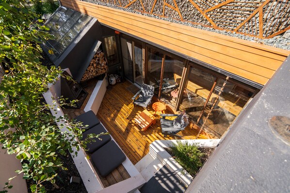 Unique private terraced patio for an evening by the fire