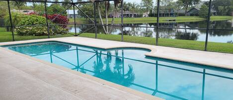 BEAUTIFUL HEATED POOL WITH SPA CORNER RIGHT ON THE LAKE.