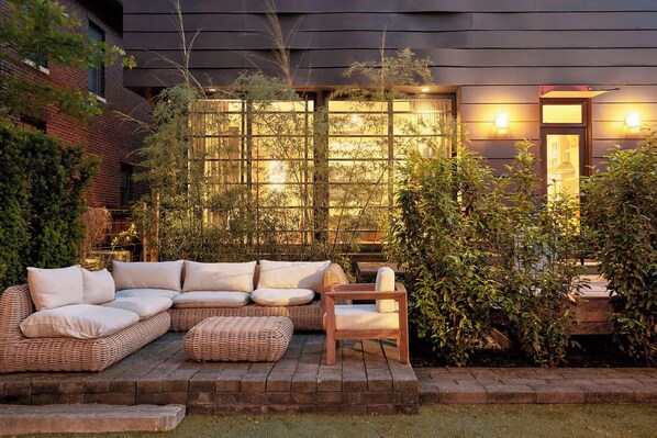 Enjoy plush seating and al fresco dining in your private, fenced patio retreat.