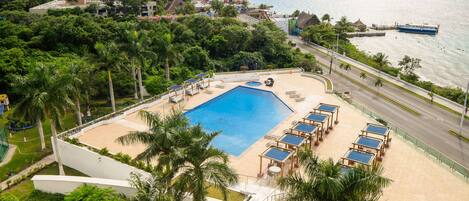 Large pool with ocean view